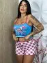 Mulher usando pijama baby doll com estampa dos personagens Stitch e Angel
